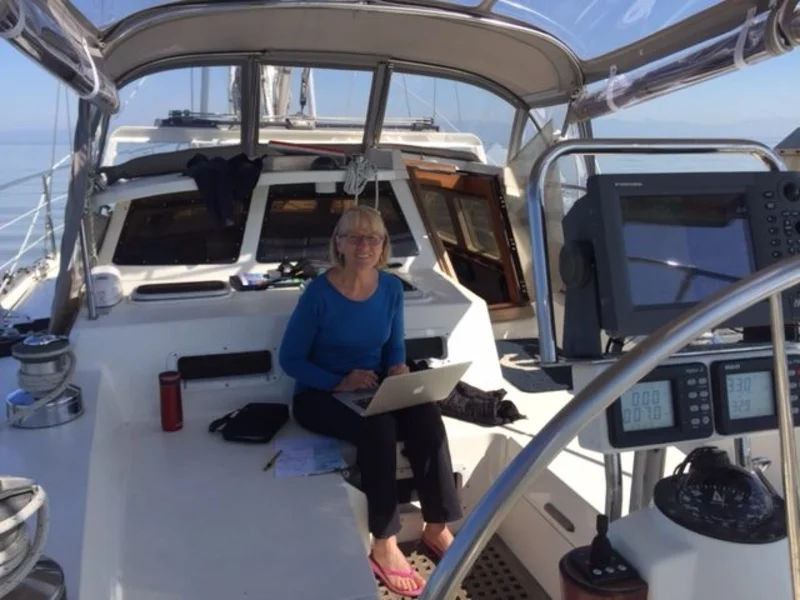 Grace editing on the sailboat